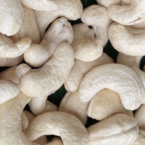 Vietnam usine Kenya noix de cajou exportation W180 qualité commerciale Santigo Vietnam usine client OEM ODM exigence - Product Image 1