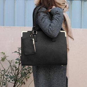 AALIYAN IMPEX-Bolsos de mano de cuero modernos y delgados para mujer con asa superior para estudiantes y oficina en la costa muy baja - Product Image 1