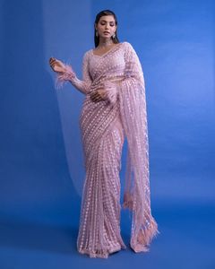 Sari da festa in stile Bollywood con bellissimi ricami di paillettes di Fabzone India