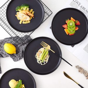 Plats et assiettes ronds en acier inoxydable et en bois et en métal parfaits pour les cuisines modernes et traditionnelles. - Product Image 6