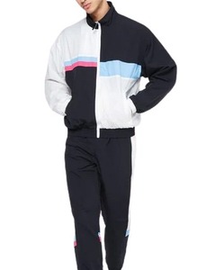 Ensemble de survêtement de sport personnalisé de haute qualité, couleur unie, bloc de couleur, 100% polyester, coupe-vent, jogging en nylon pour hommes - Product Image 1