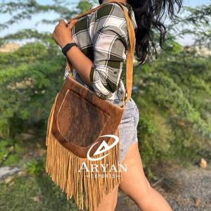 กระเป๋าสะพายพาดลำตัวหนังแท้สำหรับผู้หญิงหนังแท้ขนแกะสไตล์โบโฮใหม่ - Product Image 1