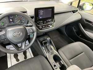 Hybrid LE FWD 4 portes 2024 d'occasion, état impeccable, sièges en tissu, moteur hybride, transmission automatique, Bluetooth, conduite à gauche, couleur foncée - Product Image 4