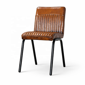 Chaise de salle à manger en cuir véritable avec structure en métal |   Sièges pour restaurant bistro industriel |   Revêtement côtelé vintage pour hôtels et villas - Product Image 1