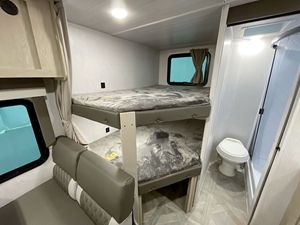 New Design X-Lite Travel Trailer 4 Person Aluminum Lightweight Modern Slide-Out <b>Kitchen</b> Black Exterior - Product Image 4