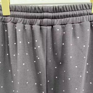 ชุดวอร์มสตรีทแวร์ฤดูหนาว ผ้าฝ้าย 100% ระบายอากาศได้ดี ลวดลายฟอกสีแบบ Acid Wash พร้อมซิป ฮู้ดดี้ ชุดแทรคสูท กางเกงวอร์มขาบานแต่งรอยขาด - Product Image 6