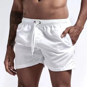 Venta al por mayor verano liso secado rápido hombres TrunkShorts impermeable malla natación pantalones cortos impresión Logo Board Shorts DDP envío - Product Image 1