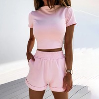 Ensemble deux pièces pour femme en coton tissé respirant couleur unie personnalisé style streetwear d'été : pull col rond et short