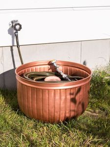 Handcrafted metal hose <b>pots</b> suitable for patios gardens yards offering functional storage with rustic appeal - Product Image 2