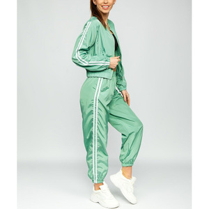 Chándal de poliéster personalizado para mujer, sudadera holgada para deportes de invierno, sudadera con cremallera y pantalón con cordón, conjunto de dos piezas - Product Image 6