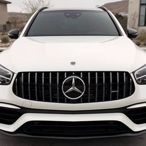 Mercedes-AMG GLC 63 2021 d'occasion en bon état, 1 propriétaire, 469 ch, V8 biturbo, transmission intégrale, Designo Diamond White - Product Image 1