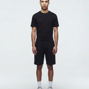 Conjunto de 2 Piezas para Hombre, Verano, Camiseta Negra de Algodón, Pantalones Cortos con Cintura Elástica, Diseño Minimalista Ligero y Transpirable, Cuello Redondo - Product Image 1