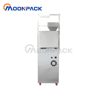 Machine d'Emballage Verticale Moonpack MP-VFFS-G-100g pour Granulés, Multi-fonctions, Pesage et Remplissage de Sacs Plastiques pour Noix de Cajou