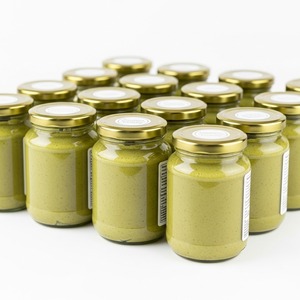 Mantequilla de pistacho cremosa fresca y orgánica rica en nutrientes y grasas saludables para fitness y estilos de vida activos - Product Image 1