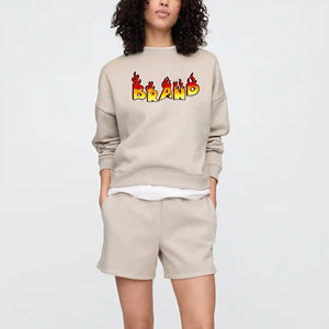 Ensemble deux pièces en coton confortable pour femmes au-dessus du genou pour short de salon et t-shirt à manches courtes avec motif solide - Product Image 1