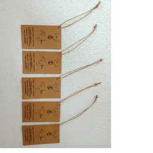 custom made recycled kraft paper tags with jute string tie rope ideal for use by clothing designers and jewelry designers