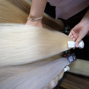 A granel 100g 12 pulgadas Color claro Extensiones de cabello virgen liso natural vietnamita Precio de procesamiento químico blanqueado - Product Image 1