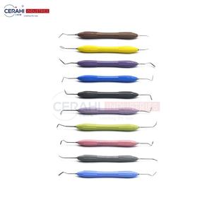 Juego de instrumentos quirúrgicos dentales de 10 piezas, relleno compuesto, Manual, clase I, mango de silicona, resina de acero, esterilización aprobada por CE - Product Image 1
