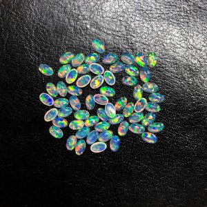 อัญมณีทรงไข่โอปอลสังเคราะห์3x4มม. ทรงรีทรงหลวมเกรด AAA + ได้รับการรับรองด้านการทำอัญมณีขายส่ง - Product Image 3