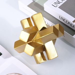 Modern <b>Gold</b> Knot <b>Statue</b> a striking minimalist sculpture designed to bring contemporary elegance to any space - Product Image 3