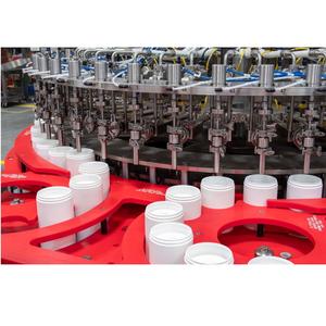 Machine de remplissage de liquides de qualité supérieure de type gravité pour le vin, le jus, le lait et les boissons non gazeuses, disponible pour l'exportation - Product Image 1