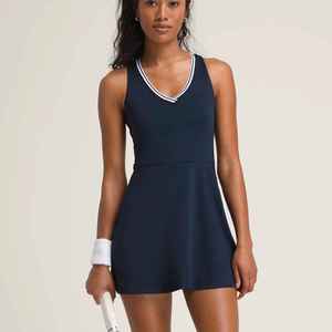 ชุดเล่นเทนนิสแบบลำลองสำหรับผู้หญิงกระโปรงเล่นโยคะแบบรัดรูปเปิดหลังแห้งเร็ว - Product Image 1