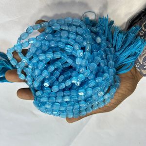 Cuentas de cristal de corte ovalado azul natural de Monalisa tipo piedra preciosa - Product Image 1