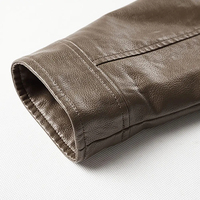 Grande demande Vente en gros OEM Veste mince en cuir PU pour hommes Manteau d'hiver gris pour garçons Veste de moto en cuir véritable