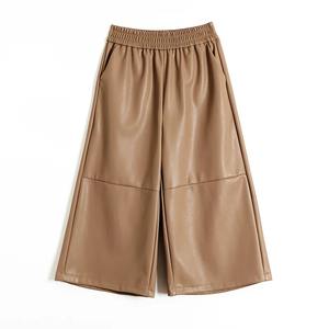 Pantalones de cuero PU hasta la pantorrilla Vintage para mujer 2024 Otoño Invierno nuevos pantalones casuales elásticos de pierna ancha con bolsillo de lona negra - Product Image 1