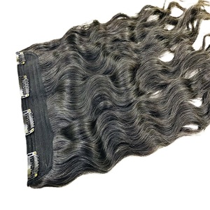 Los exportadores indios ofrecen extensiones de cabello humano ondulado natural de alta calidad de doble estiramiento para mujeres Extensiones de cinta de calidad a precios bajos - Product Image 2