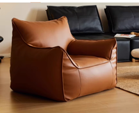 Fauteuil lounge individuel en cuir PU de style nordique, design moderne pour hôtel, villa, salon compact, chambre, balcon