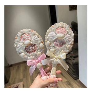 Elegant seashell <b>mirror</b> polished for interior decoration presenting natural shell design suitable for export and households - Product Image 1