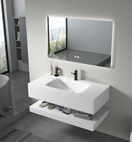 Ensemble de meuble-lavabo de salle de bain avec vasque sous-plan incurvée en pierre frittée grise, bande LED intégrée et miroir rétroéclairé pour la décoration de la maison et des hôtels