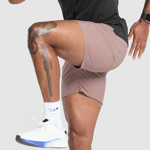 Vente en gros de shorts de basket-ball pour hommes à séchage rapide vêtements de sport décontractés pour entraînement de fitness poches en coton décoration à motif teint uni - Product Image 6