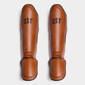 Protection de tibia de kickboxing de haute qualité avec logo personnalisé, fermeture à boucle et crochet, protection ultime pour les jambes - Product Image 1