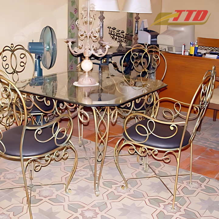 Elegant wrought iron tables and chairs set designed for restaurants manicures or home patio with vintage artistic style