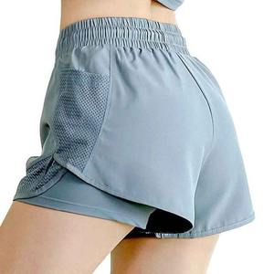 Pantalones cortos de Yoga de cintura alta sin costuras para mujer con logotipo personalizado al por mayor - Product Image 1