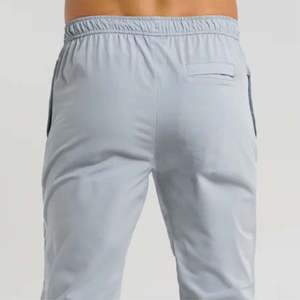 Pantalones grises clásicos: estilo elegante con dobladillo abierto con cómoda cintura híbrida y bolsillos funcionales - Product Image 5