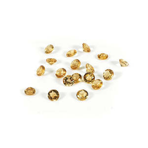 พลอยซิทรินสีเหลืองธรรมชาติขนาด 5 มม. และ 6 มม. ทรงกลมปรับขนาดแล้ว - Product Image 1