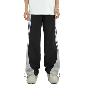 Vente en gros Pantalon en nylon pour homme Pantalon de survêtement coupe-vent en nylon personnalisé Pantalon de survêtement patchwork en nylon à rayures latérales Pantalon pour homme - Product Image 4