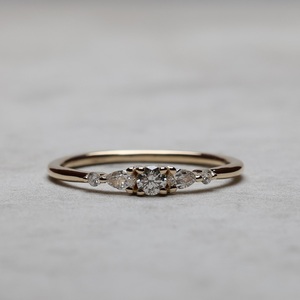 4mm Round Cut Moissanite Engagement <b>Ring</b> with Pear and Round Side Stones | <b>Dainty</b> Wedding Jewelry - Product Image 1