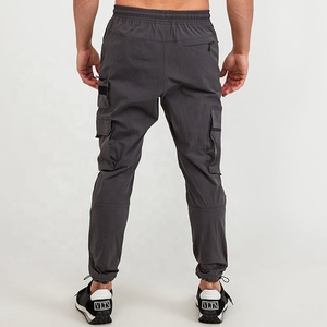 Pantalones cargo con diseño de logotipo personalizado Pantalones rectos para hombre con bolsillos Pantalones para correr de lana para hombre con estilo Pantalones de chándal de invierno cálidos - Product Image 4