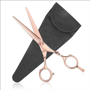 Ciseaux de coiffeur en or rose de 5.5 pouces avec repose-doigt Ciseaux de beauté de qualité industrielle avec pochette en cuir - Product Image 1