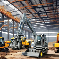 Excavator roda dengan kapasitas ember 0,26m, alat penggali (rake), berat operasi 3600kg, dilengkapi thumb excavator dan mesin.