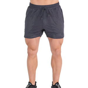 กางเกงขาสั้นตาข่ายสำหรับเด็กผู้ชายสีดำระบายอากาศได้ดีสวมใส่สบายกางเกงฝึกกีฬาผ้าตาข่ายวิ่ง - Product Image 1
