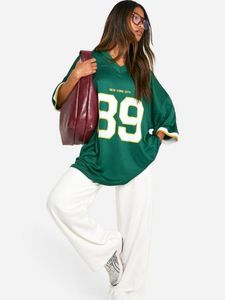 เสื้อฟุตบอลคอวีโอเวอร์ไซส์ใส่ได้ทั้งชายและหญิงสวมใส่สบายและมีสไตล์สำหรับผู้เล่นฟุตบอลชายและหญิง - Product Image 3