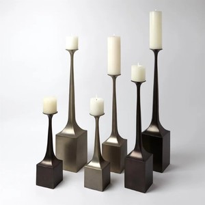 Candlestick <b>Holder</b> features a sleek and modern design constructed from cast <b>bronze</b> with a dark brown <b>Holder</b> Modern - Product Image 5