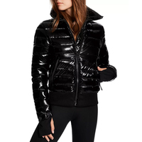 Veste matelassée élégante pour femme, à manches longues, épaisse, chaude, respirante, écologique, en polyester tricoté, avec capuche, pour l'hiver