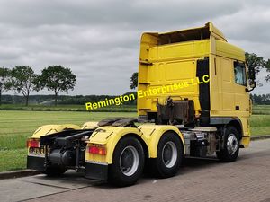 Camion tracteur DAF XF 104 6x4 d'occasion 2011, conduite à gauche, Euro 5, moteur diesel Cummins, transmission automatique, suspension pneumatique robuste - Product Image 4