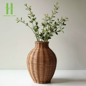 Elegante jarrón de ratán tejido a mano con asas para la decoración del hogar, jarrón decorativo natural para flores secas, proveedor mayorista de Vietnam - Product Image 1